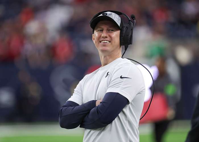 Texans offensive coordinator Bobby Slowik smiles before the game against the Cleveland Browns at NRG Stadium.